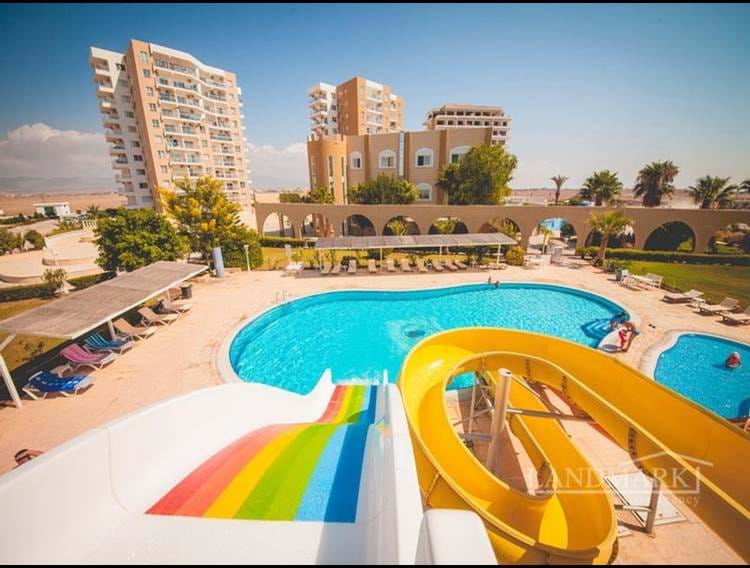 شقة 2 غرف نوم + 5 حمامات سباحة مشتركة + مركز سبا + 600 م من الشاطئ الرملي + خطة الدفع