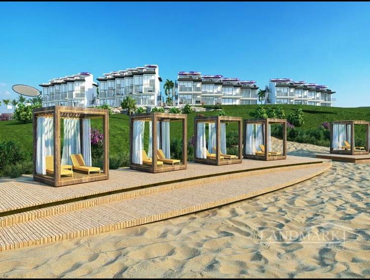 Роскошные апартаменты с 2 спальнями на берегу моря с общим бассейном + песчаным пляжем, с возможностью оплаты
