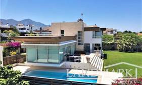 4 bedroom LUXURY - SEA FRONT villa + contemporary design + 10m x 5m swimming pool + furnished + central heating system  + air conditioners