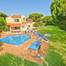 Uma bela vila isolada com 5 quartos com jardim magnífico e com piscina privativa na área tranquila de Vilamoura.