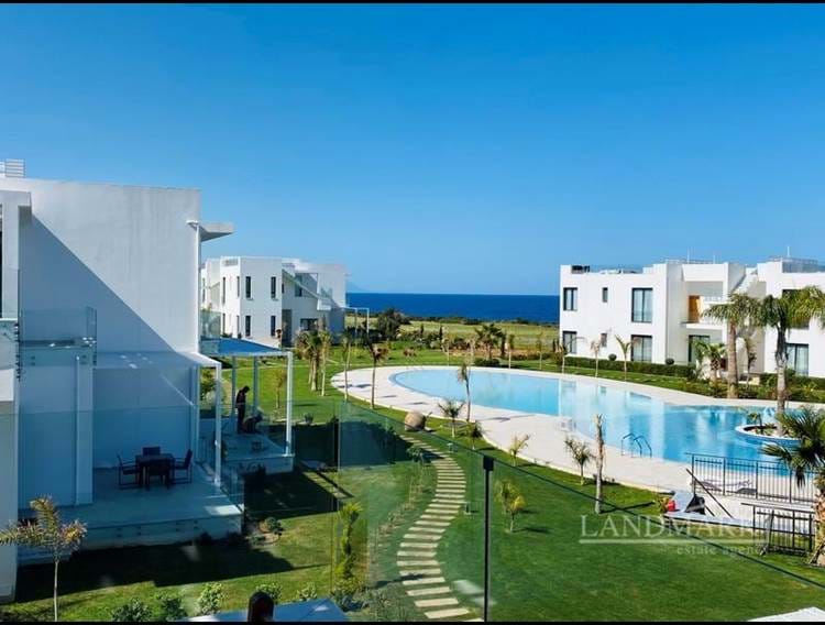 2 bedroom luxury Seafront garden apartment + communal swimming pools + within a perfect holiday complex with many amenities