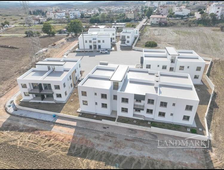 2-bedroom garden apartment & penthouses + communal swimming pool + Turkish title deeds