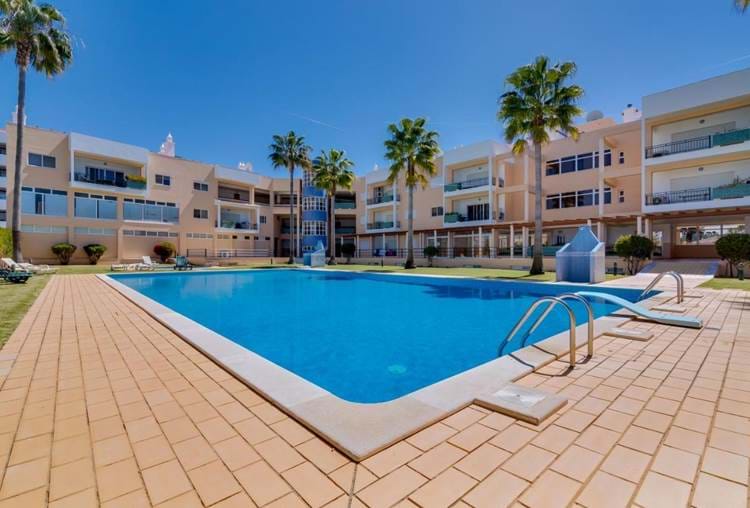 A beautiful modern large 3 bed ground floor apartment opposite the GNR / Police station and a 3 min walk to the marina and beach  called Marina Sol , condominium.