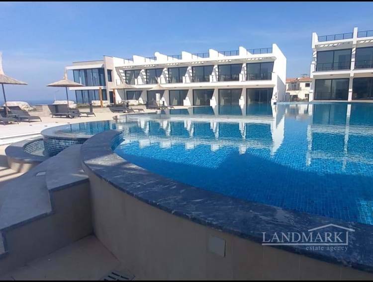 Brand new penthouse studio apartment + communal pool + pool bar + walking distance to the beach