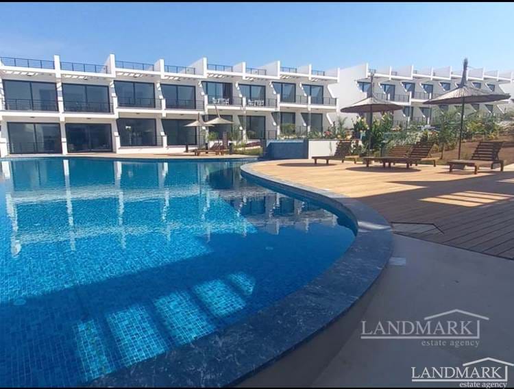 Brand new penthouse studio apartment + communal pool + pool bar + walking distance to the beach