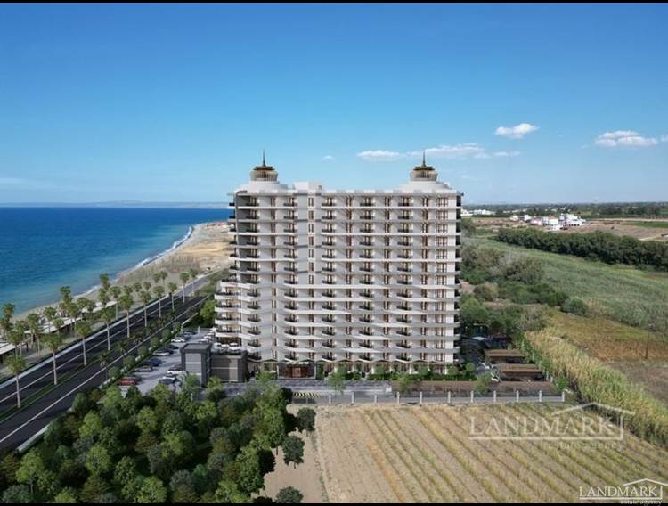 Apartments mit 1 Schlafzimmer in einer exklusiven Strandresidenz + Sandstrand + Innen- und Außenpools + Zahlungsplan + türkische Eigentumsurkunden