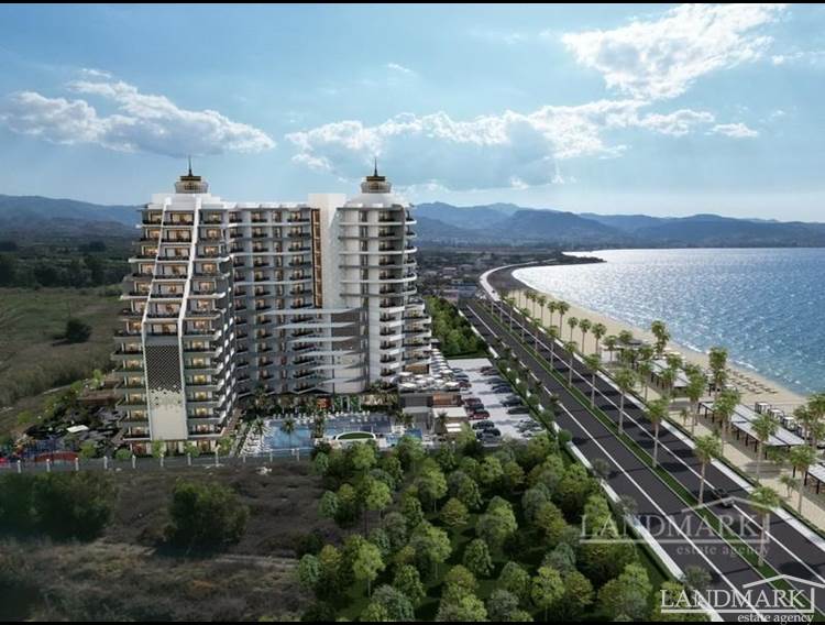Lägenheter med 1 sovrum i en exklusiv bostad vid stranden + sandstrand + inomhus- och utomhuspooler + Avbetalningsplan + Turkiska lagfarter