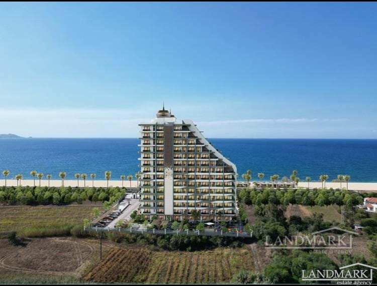 Apartments mit 1 Schlafzimmer in einer exklusiven Strandresidenz + Sandstrand + Innen- und Außenpools + Zahlungsplan + türkische Eigentumsurkunden