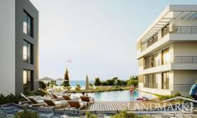 Located in Lapta – Prices from £99,950 1-bedroom apartments + infinity swimming pools + gym + views + Payment plan + Turkish title deeds