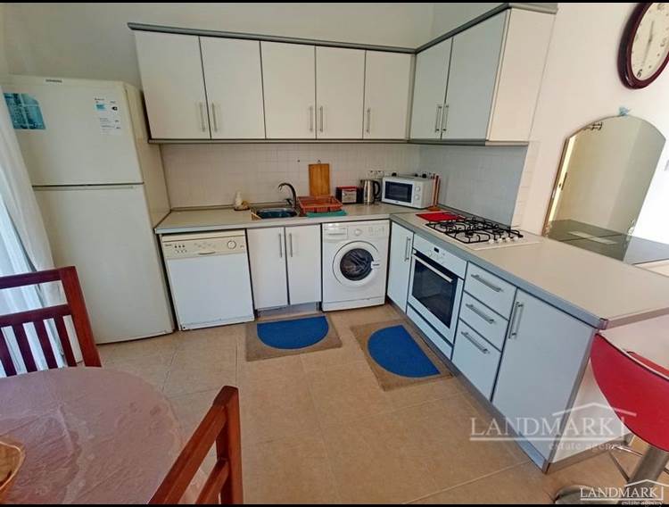 2-bedroom ground floor resale apartment + fully furnished + white goods + communal pools + restaurant + bistro bar + walking distance to the beach + Title deed in the owner’s name, VAT paid